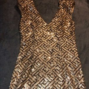 Flirty little Aztec number. Perfect cheeky V neckline that dips juusstt enough.